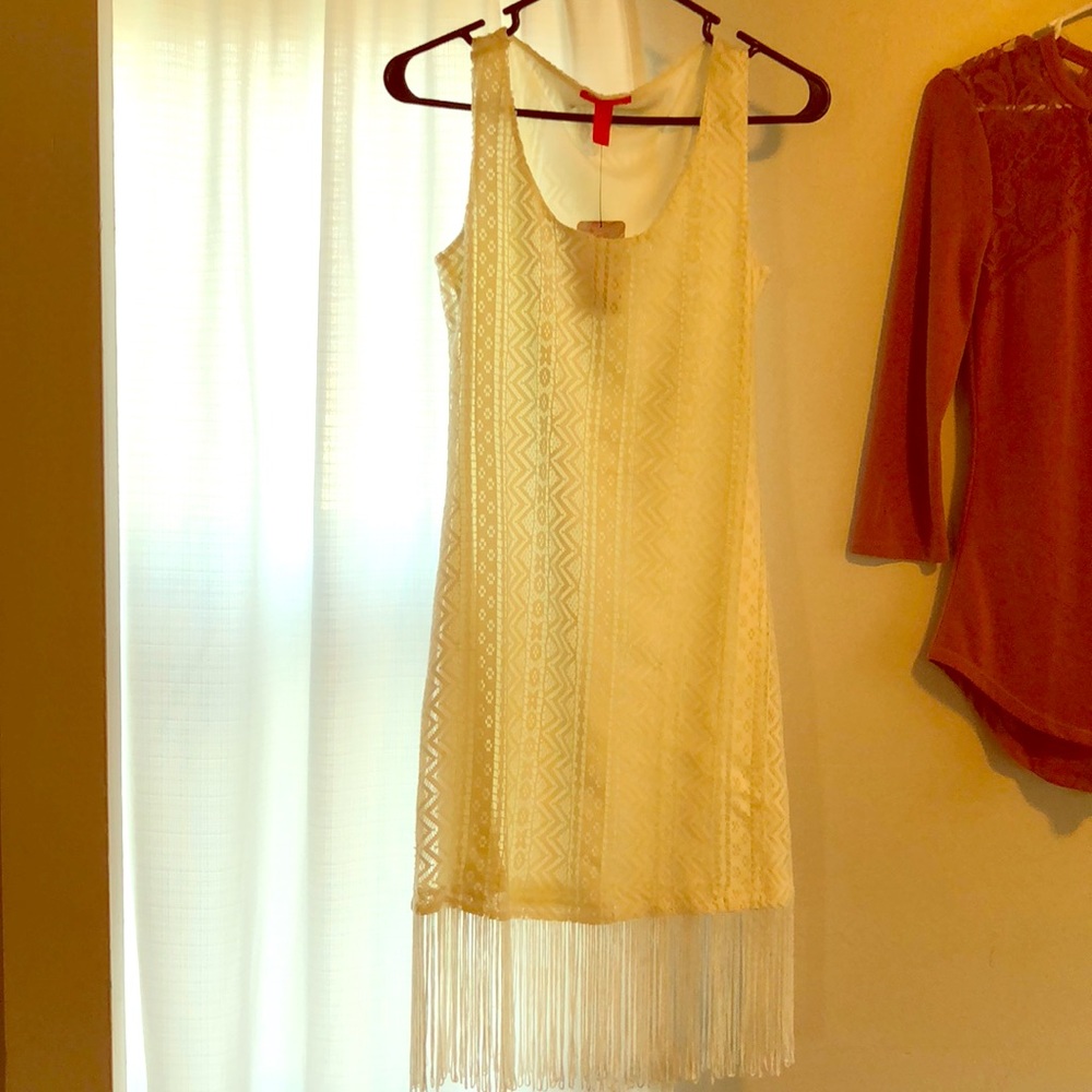 White lace dress with tassel bottom